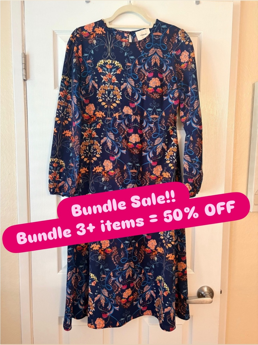 Kacey Montoya’s Closet | I. Madeline Navy Floral Long-Sleeve Midi Dress